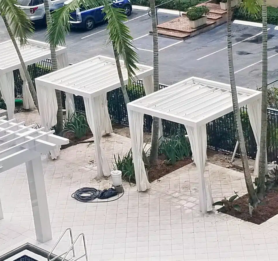 cabana w roman retractable outdoor shades in miami 1 auto x2 colored toned light ai