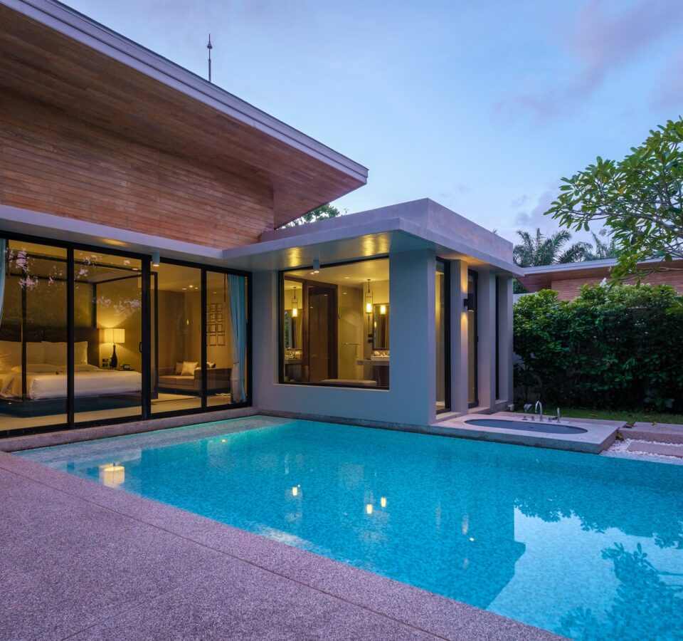 Modern house with a swimming pool, modern pool villa at the beach