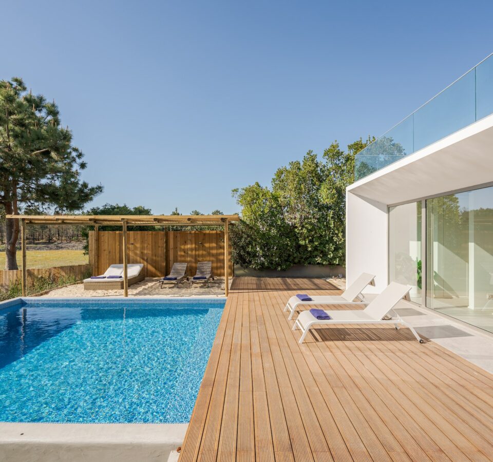 Modern villa with pool and deck with interior
